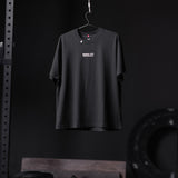 Tech Essential Relaxed Tee in black with RP Wings Stack graphic, displayed on hanger