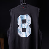 Black Tech Essential Relaxed Cutoff tank with marble 8 graphic, back view on hanger