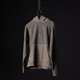 SS'20 Reverse Weave Hoodie in taupe, displayed on hanger against black background