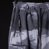 SM'20 Cargo High Rib joggers in grey with abstract print design, hanging on hanger detail shot