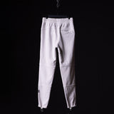 WN'20 Terry Relaxed Jogger in white, displayed on hanger against black background