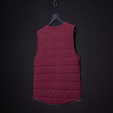 flatlay FA'22 Adventure Vest in burgundy, front view on hanger
