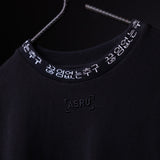 WN'20 Oversized Cinch Tee detail shot showing black neckline with white embroidered branding and Korean text