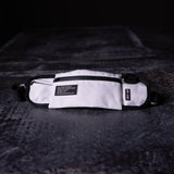 flatlay WN'18 Training Belt Pack in white and black, top view