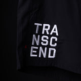 SP'22 Vintage 5" Training Short in black, detail shot of embroidered TRANSCEND logo