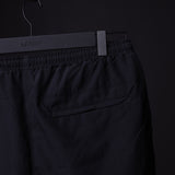 SP'22 Vintage 5" Training Short in black on hanger, detail view