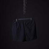 SP'22 Vintage 5" Training Short in black, displayed on hanger against dark background