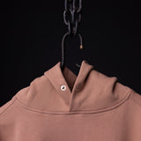 Tech Terry Eagle Hoodie in tan, detail shot of collar and chain hanger