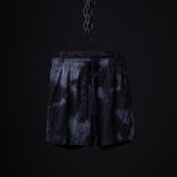 SM'21 Tie Dye Mesh Liner Short in navy, suspended on chain against black background