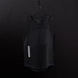 Black mesh utility tank on hanger against dark background, front view