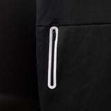 SP'20 Mesh Utility Tank detail shot of white zippered pocket on black fabric
