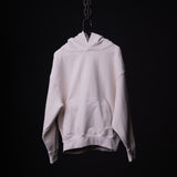 FA'22 Tech Terry Eagle Hoodie in light gray, hanging on chain against black background