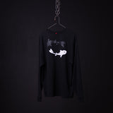 Black long-sleeve graphic sweatshirt with white whale and violin design on hanger against dark background