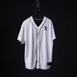 FA'21 Reversible Jersey in white, displayed on hanger against black background