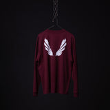 SM'22 Graphic Long Sleeve in maroon with white wing design on back, displayed on hanger