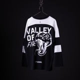 SM'23 Mesh Long-sleeve Jersey in black and white, hung on hanger against dark background