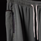 Garment Dyed Zip Jogger in charcoal gray, detail shot of side pocket and drawstring