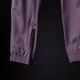 WN'22 Cyber Zip Jogger detail shot showing side zipper on purple jogger leg cuff
