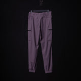 Flatlay of WN'22 Cyber Zip Jogger in mauve purple with cargo pockets, front view