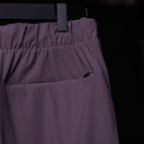 WN'22 Cyber Zip Jogger in mauve, hung on hanger showing waistband and pocket detail