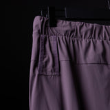 WN'22 Cyber Zip Jogger in mauve, detail shot of waistband and side pocket on hanger