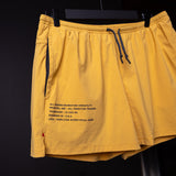 SM'24 Run Short in yellow, displayed on hanger showing front design and branding details