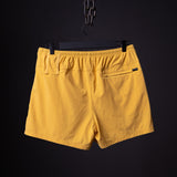 flatlay SM'24 Run Short in yellow, back view on black hanger