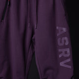 WN'23 Tech Terry High Rib Jogger in purple, worn on model, side view