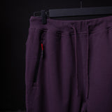 Tech Terry High Rib Jogger in deep purple, detail shot of pocket and drawstring