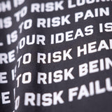 OTWR Poem Graphic Longsleeve detail closeup showing white text print on black fabric