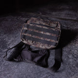 Flatlay SP'19 Trail Pack Chest Rig in camo and black, front view