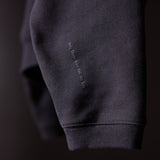 2021 Zip Pocket Quarter Zip in charcoal gray, close-up detail of sleeve and pocket