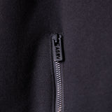2021 Zip Pocket Quarter Zip closeup of black zipper pull and metal slider detail