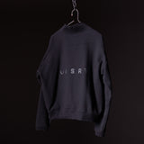ASRV 2021 Zip Pocket Quarter Zip sweatshirt in black, displayed on hanger against dark background