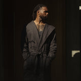 ASRV x Walden Heavyweight Robe in carbon, worn by model in profile stance