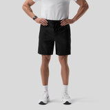 Black Aerotex™ 8" Training Short on model wearing white tee and white sneakers, front view