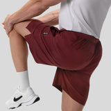 Aerotex™ 8" Training Short in Crimson, worn by model stretching leg