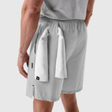 Aerotex Training Short in Slate Grey worn by model, back view with towel detail