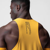 Laser-Vent Singlet Tank in amber with perforated mesh fabric, worn by model, back view