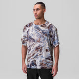 Ice-Skin Oversized Tee in white/blue/brown Realtree print, worn by model, front view