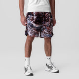 Towel Terry Relaxed Short in burgundy camo, modeled with white socks and sneakers
