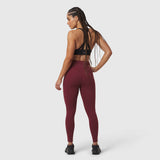 W002. LYCRA® ADAPTIV Legging in crimson, back view on model