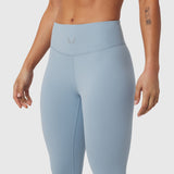 W002 LYCRA® ADAPTIV Legging in light sky, worn by model, front view