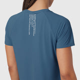 W017 Laser-Vent Established Tee in storm blue, back view on model