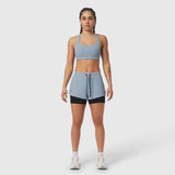 Tetra-Lite Liner Short in light sky and black, worn with matching sports bra, front view