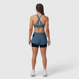 Tetra-Lite Liner Short in storm blue and black, rear view on model
