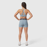 W027 Lycra Ribbed Short in light sky, rear view on model