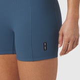 W027 Lycra ribbed shorts in storm blue, worn by model, side detail view