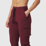 Tetra-Lite Cargo High Rib Jogger in crimson, worn by model, side view