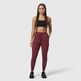 Tetra-Lite® Cargo High Rib Jogger in crimson, worn with black sports bra, front view
